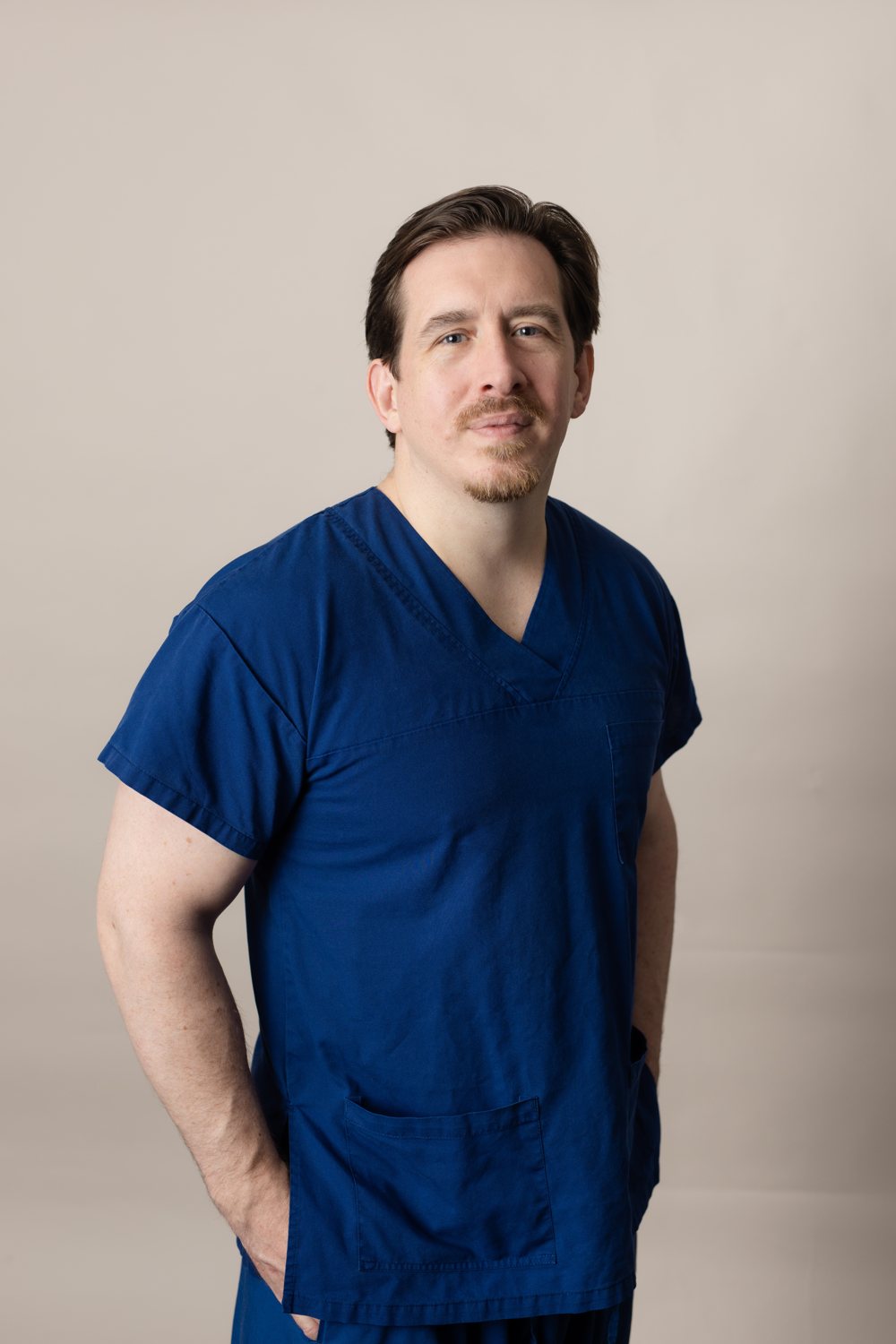 David McCormack in surgical scrubs